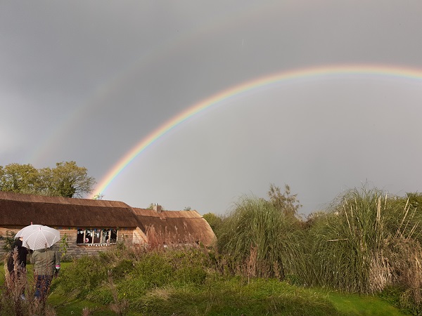 Rainbow on a thatched Roof in Ireland