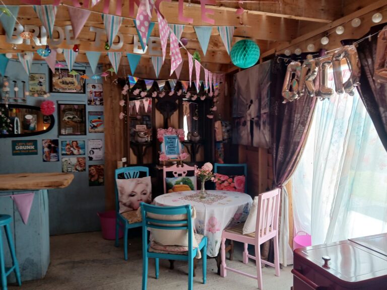 Cosy decorated indoor bar and lounge with bunting