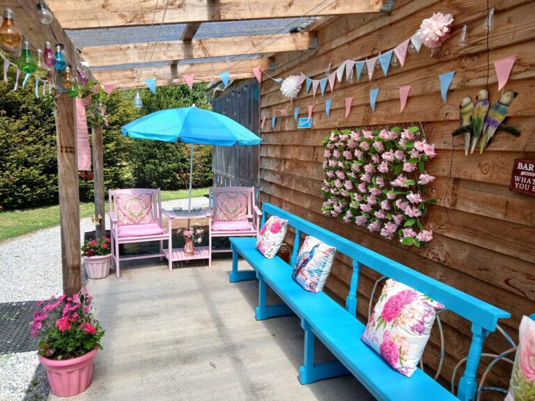 Sunny hen party terrace with parasol and bunting